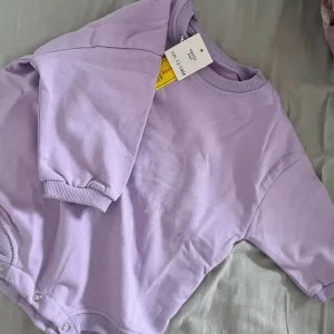 Received Baby Cotton Long Sleeve Bubble Romper from customer U****i.